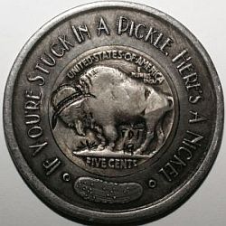 Obverse and reverse of hand carved Hobo encased 1935 Buffalo nickel.
