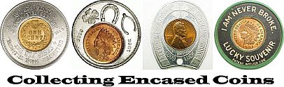 4 encased cents, reverse of indian head, off center, horseshoe and a vulcanite encased
