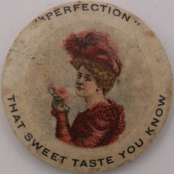 Celluloid encased 1902 cent - Perfection Wafers