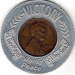 Victory Encased Obverse type 1 with scrolls and laurel - Victory at top World Peace at bottom - V-E Day May 8 at left V-J Day Sept 2 on right